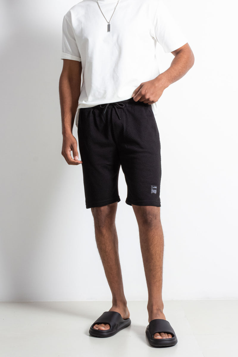 TEXTURED BERMUDA SHORTS