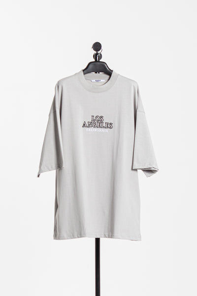 T-SHIRT WITH EMBROIDERED SLOGAN