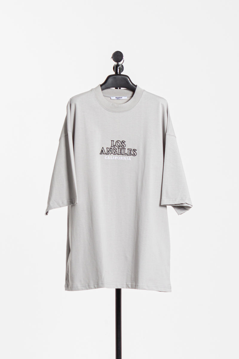T-SHIRT WITH EMBROIDERED SLOGAN