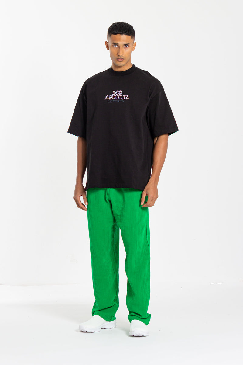 T-SHIRT WITH EMBROIDERED SLOGAN