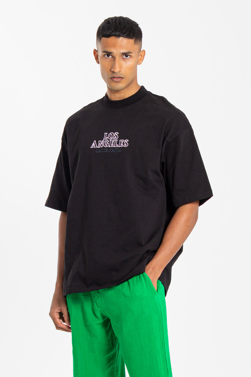 T-SHIRT WITH EMBROIDERED SLOGAN