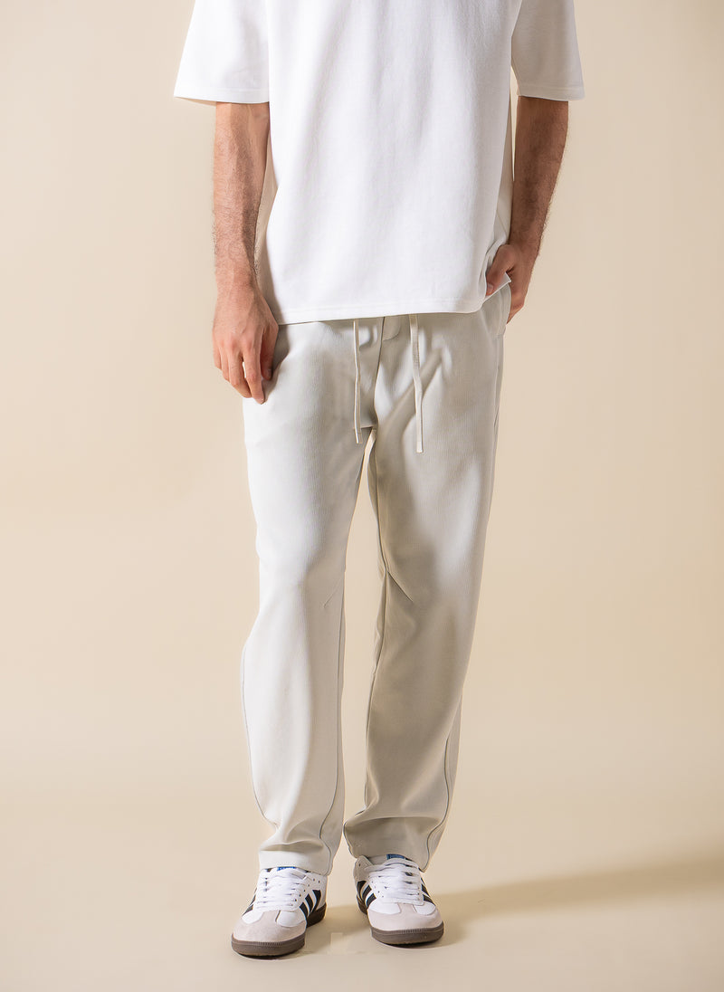 TEXTURED JOGGER-WAIST TROUSERS