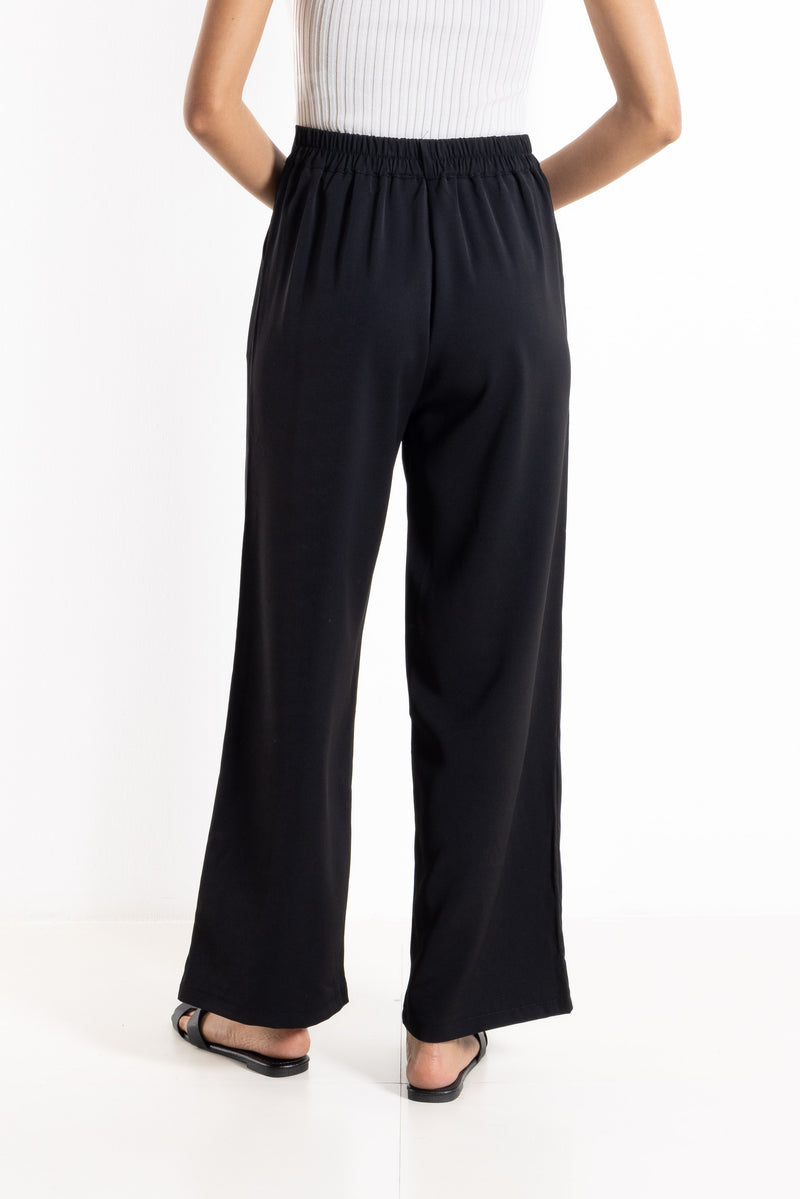 PLEATED HIGH-WAIST TROUSERS